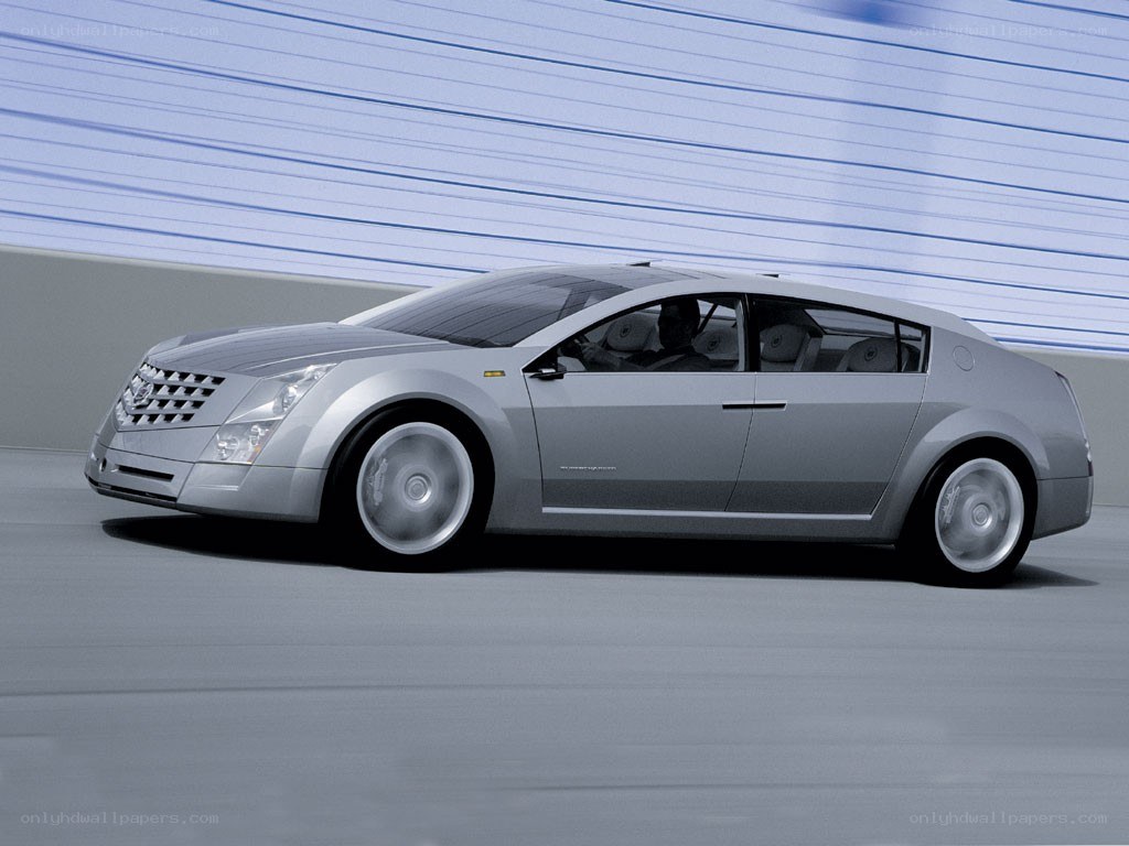silver concept car in motion