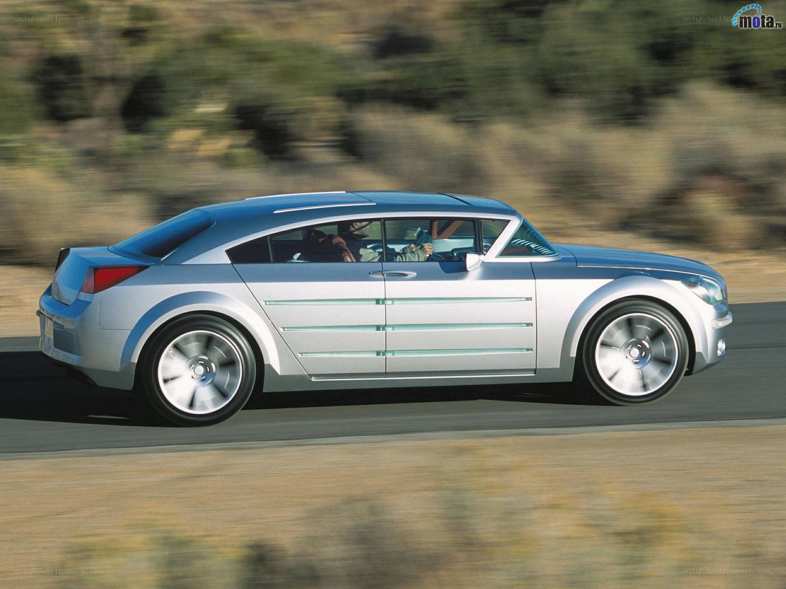 silver concept car in motion