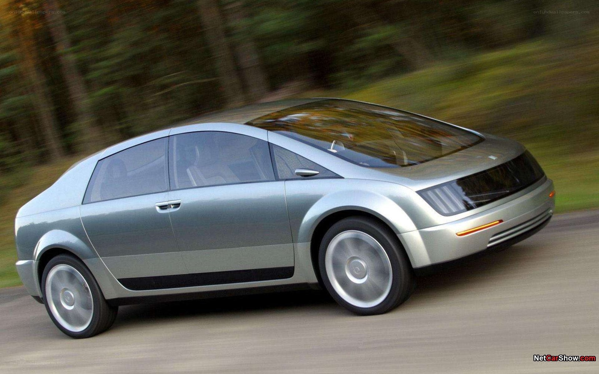 silver concept car in motion