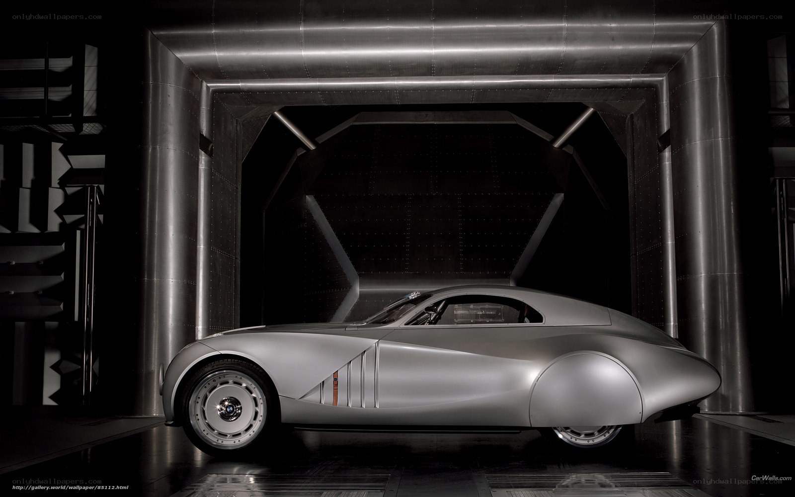 Silver concept car in tunnel
