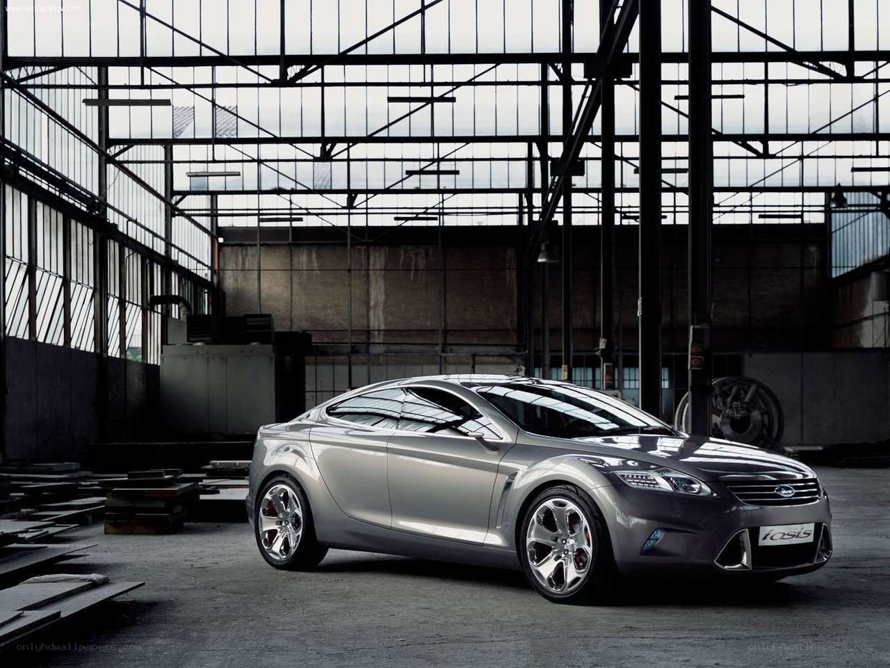 Silver concept car in warehouse
