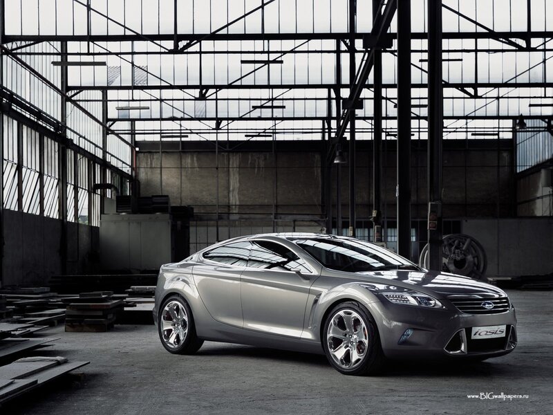 Silver concept car in warehouse