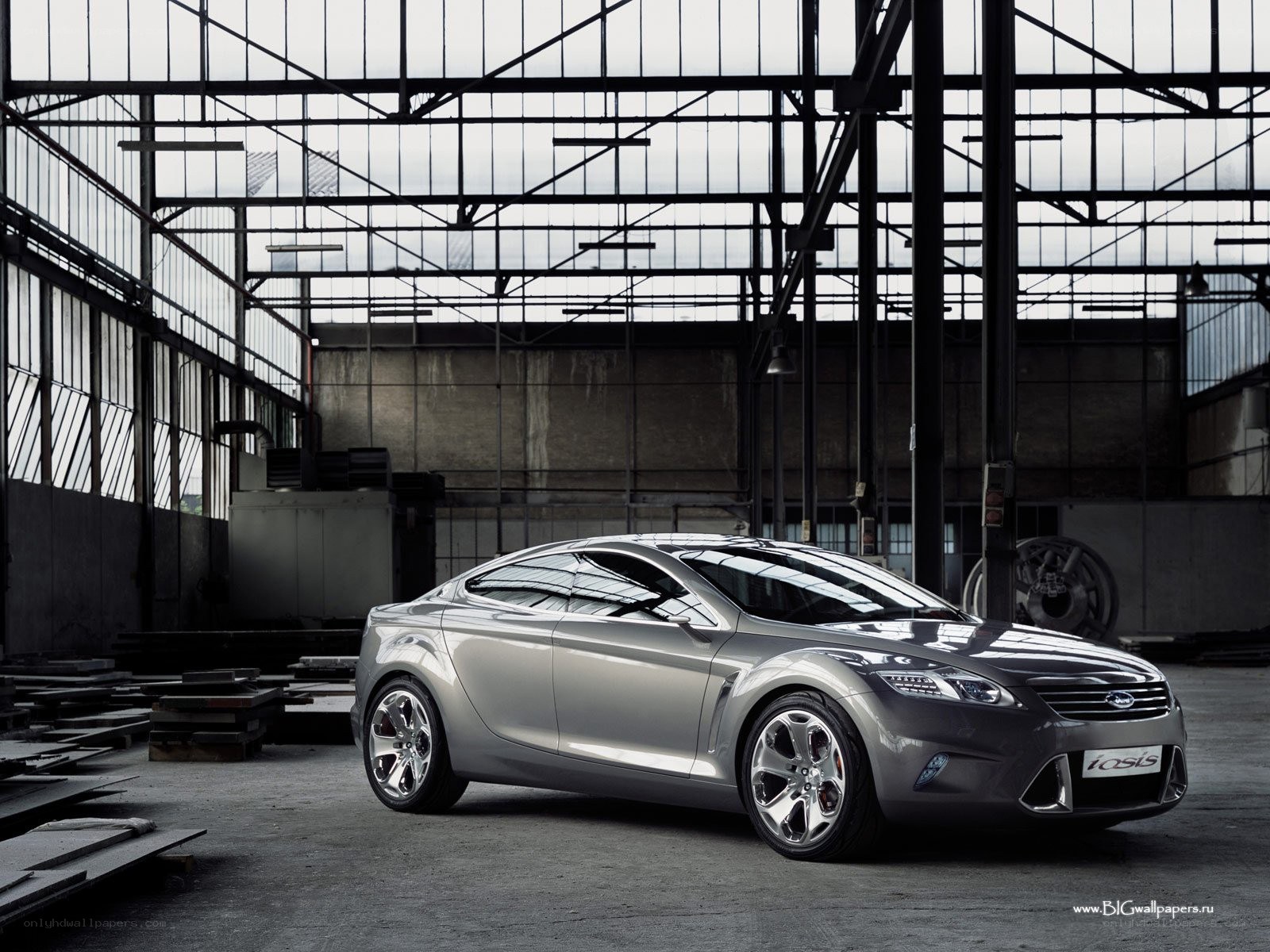 Silver concept car in warehouse