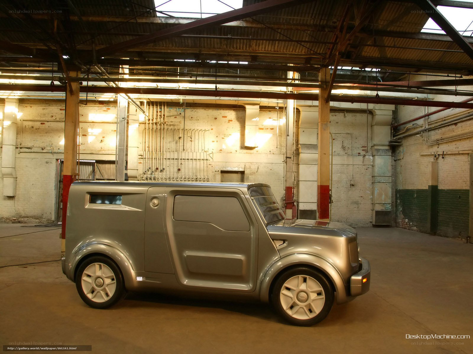 Silver concept car in warehouse