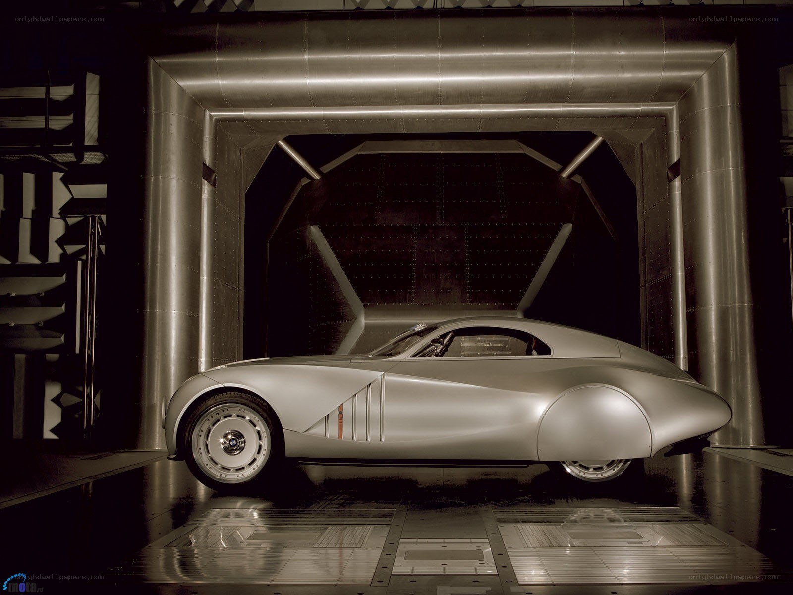 Silver concept car in wind tunnel
