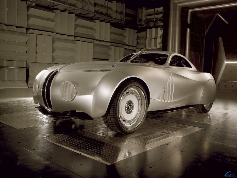 silver concept car in wind tunnel