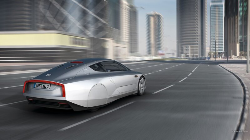 silver concept car on city street