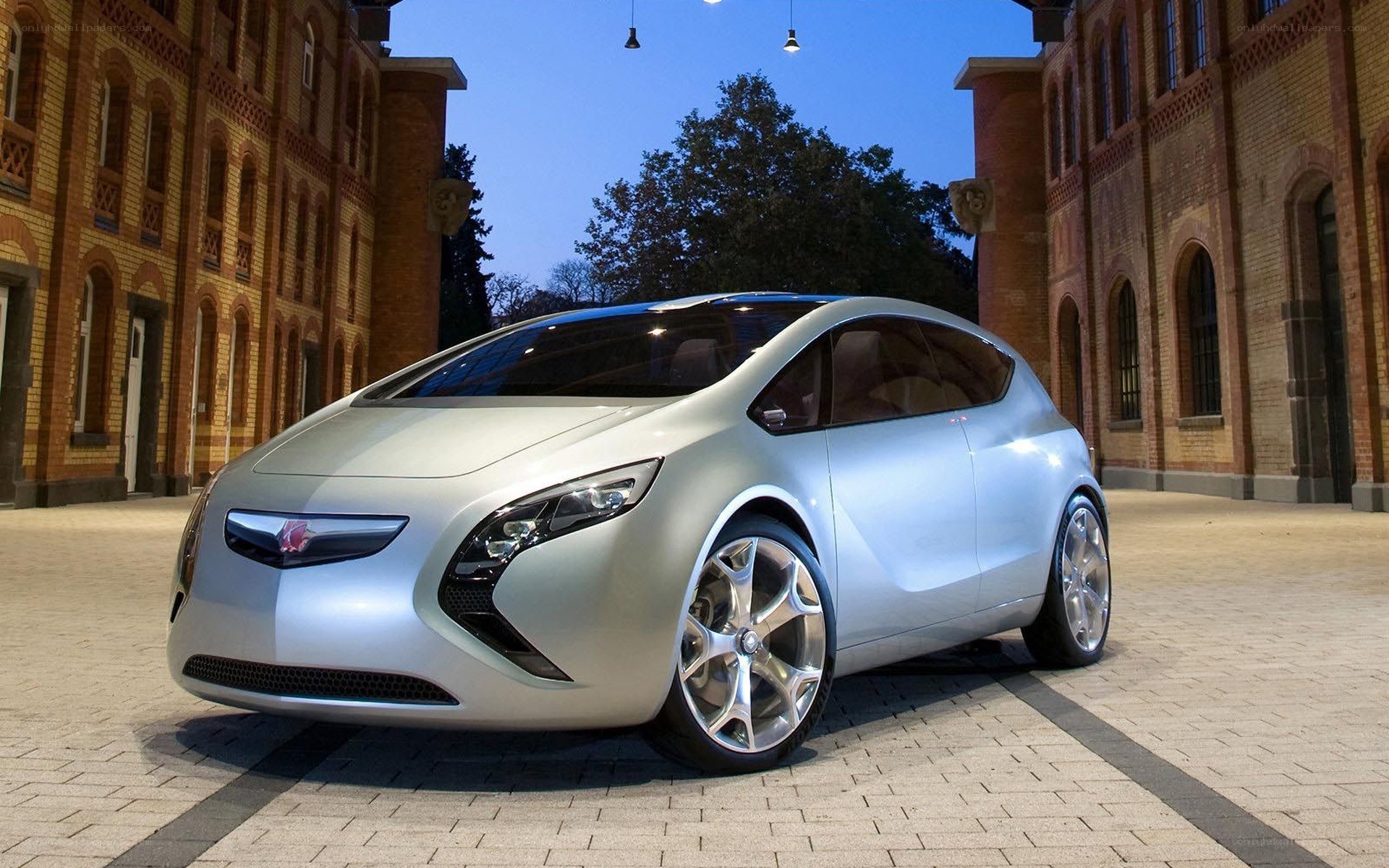 Silver concept car on cobblestones