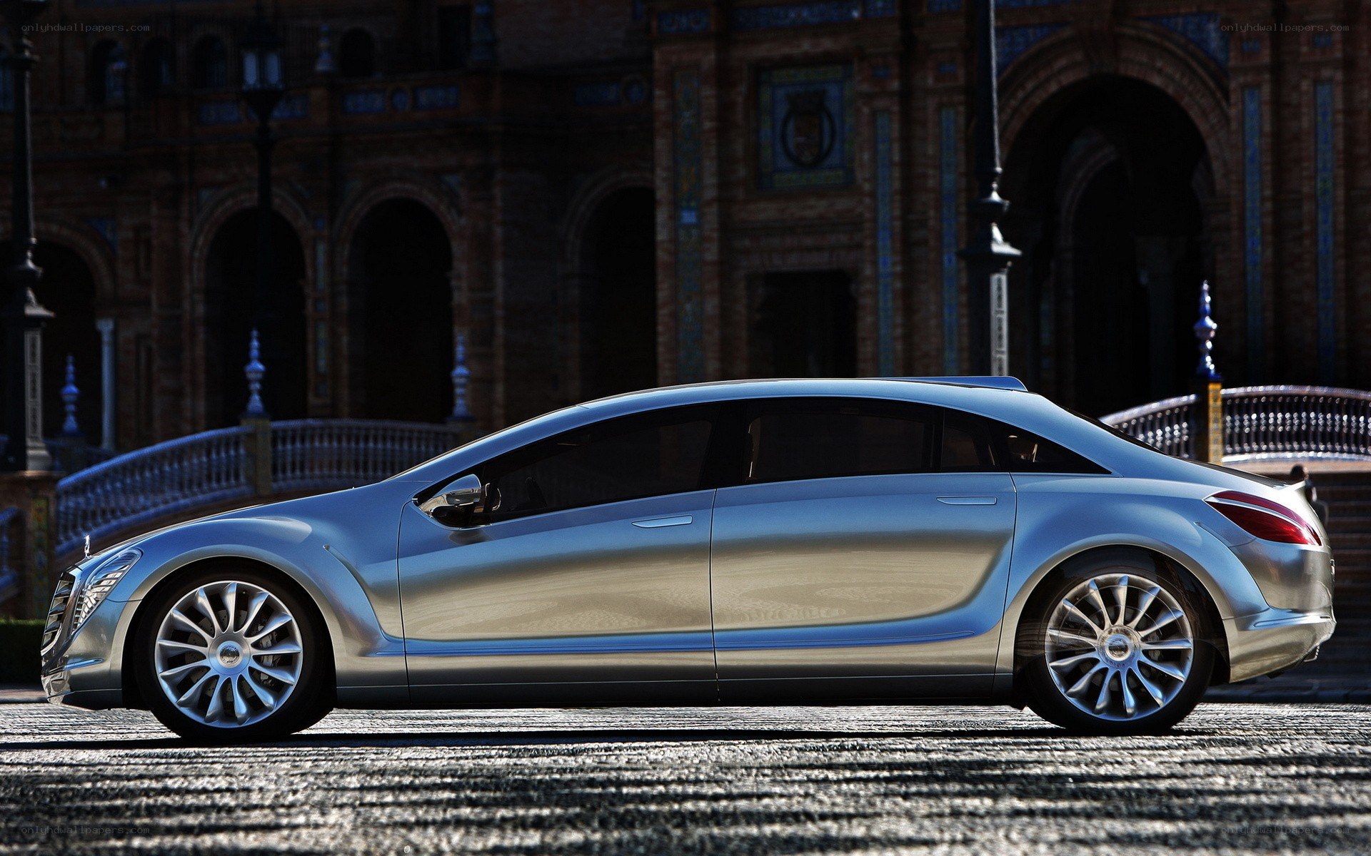 Silver concept car on cobblestones