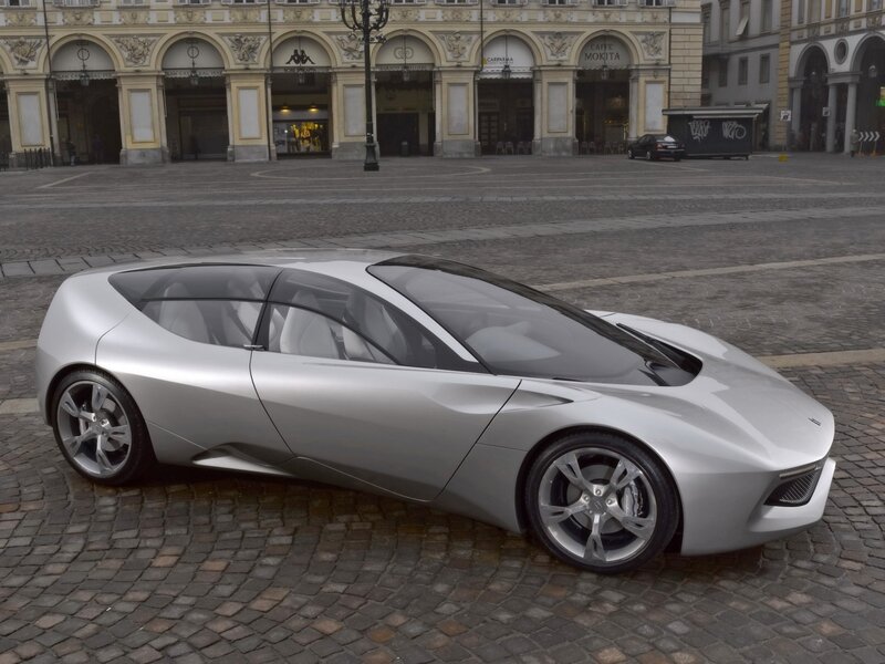 Silver concept car on cobblestones
