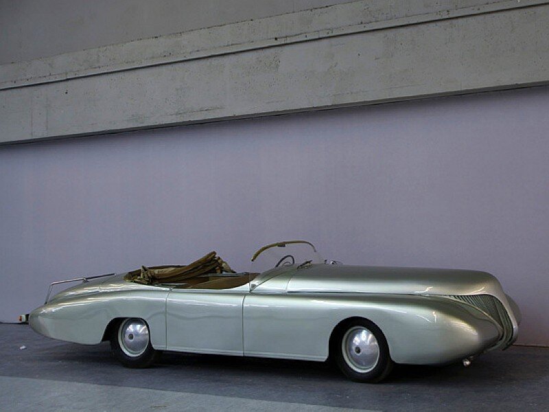 Silver concept car on display