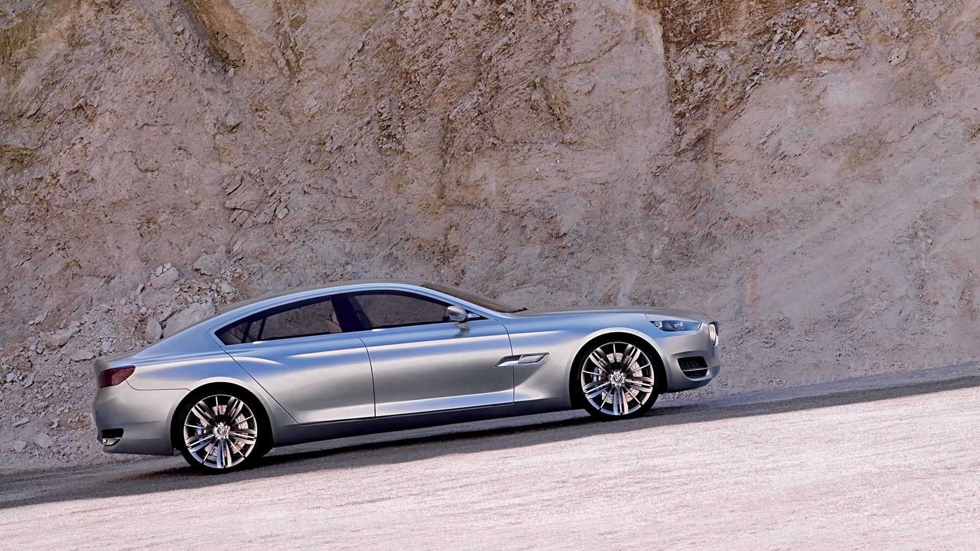 silver concept car on road