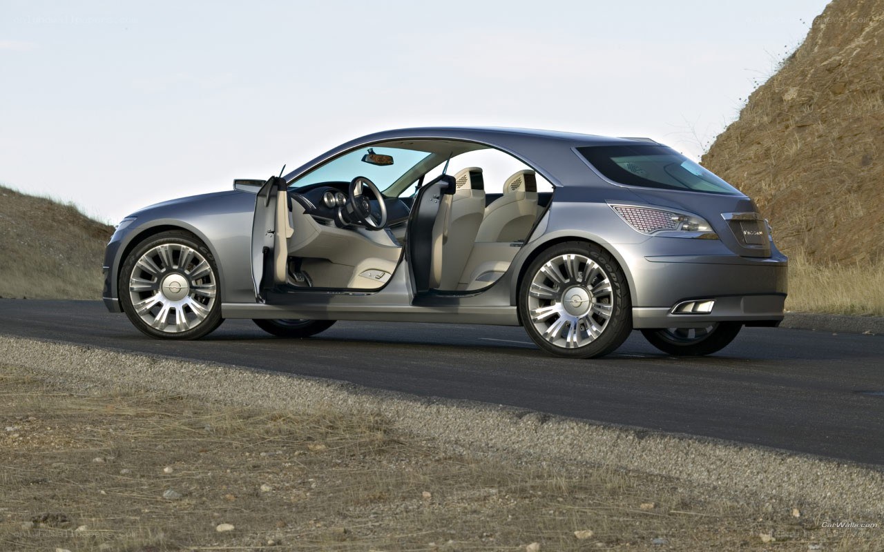 silver concept car on road