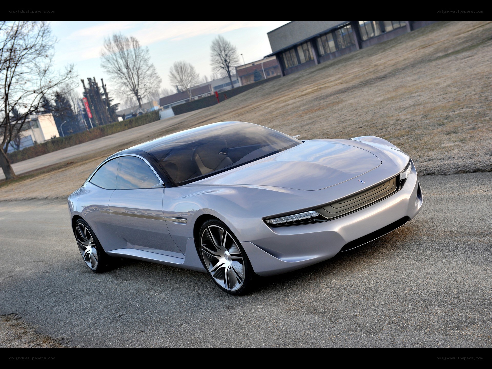 silver concept car on road