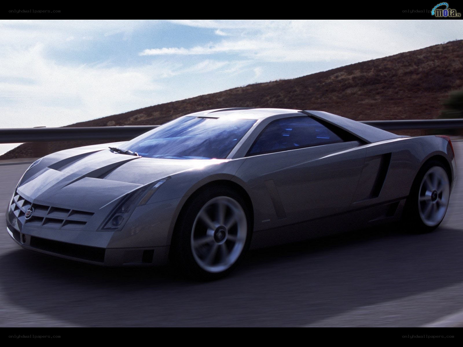 silver concept car on road