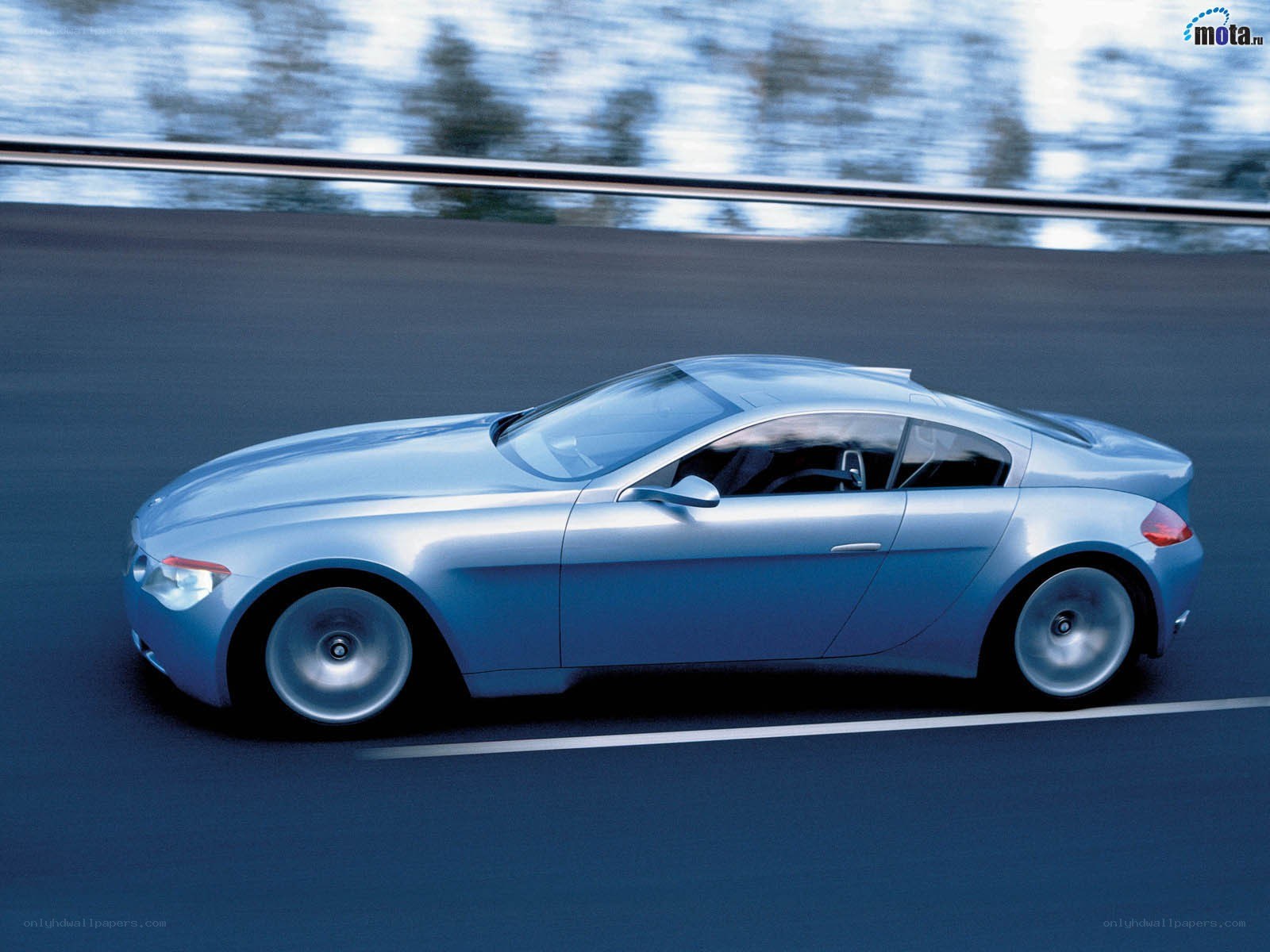 Silver concept car on road