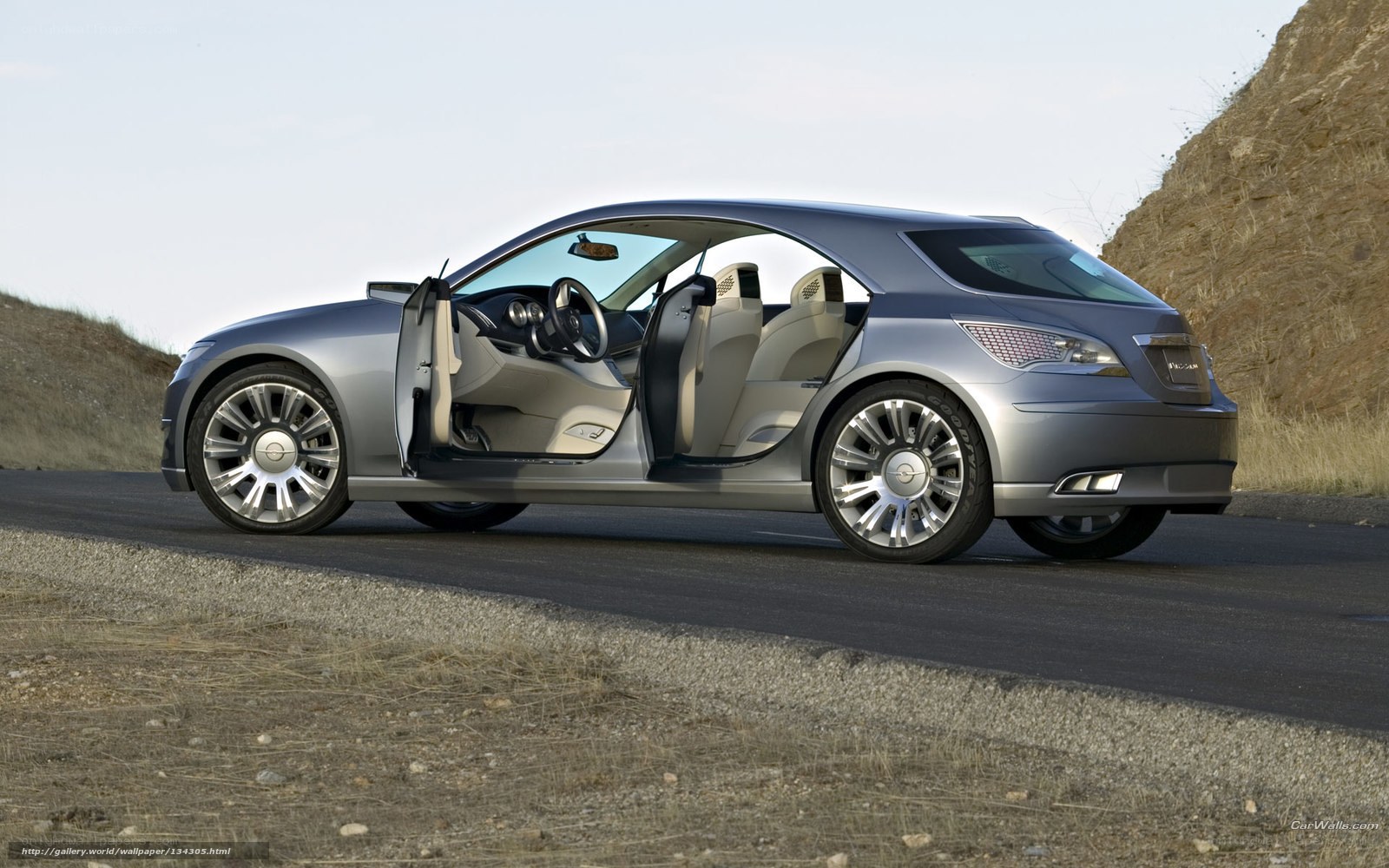 silver concept car on road