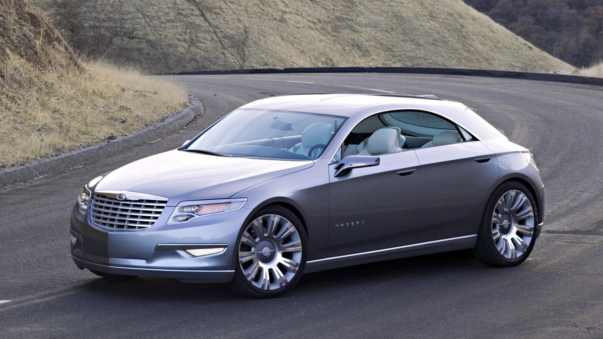 silver concept car on road