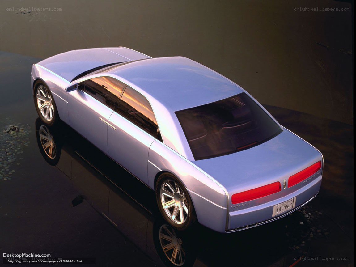 silver concept car on water