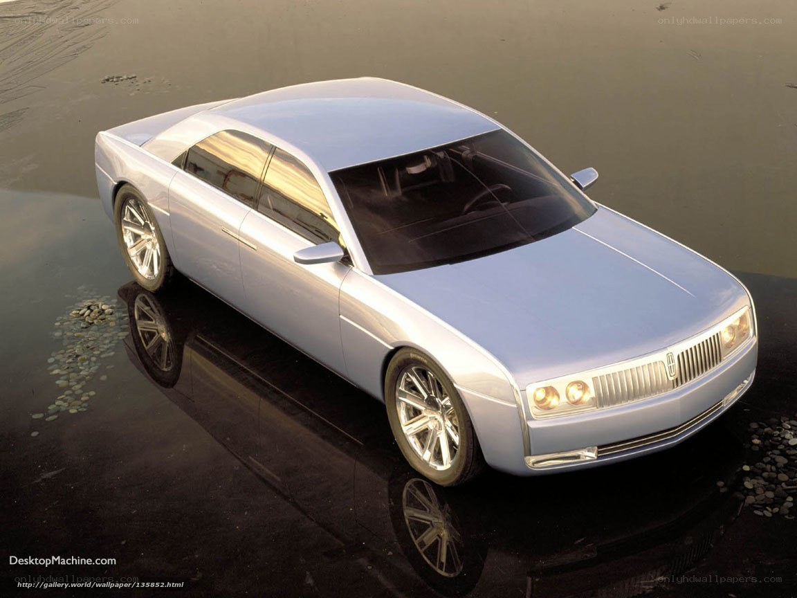 silver concept car on wet surface