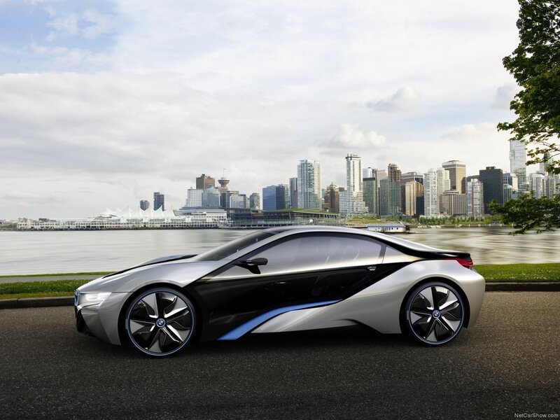 Silver Concept Car — Serene, Afternoon, Photograph, City Skyline, River