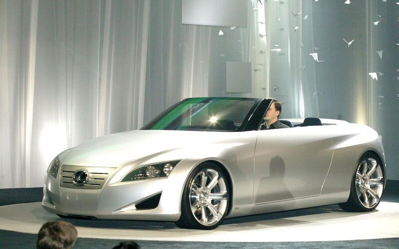 Silver Concept Car — White, Dramatic, Photograph, Man
