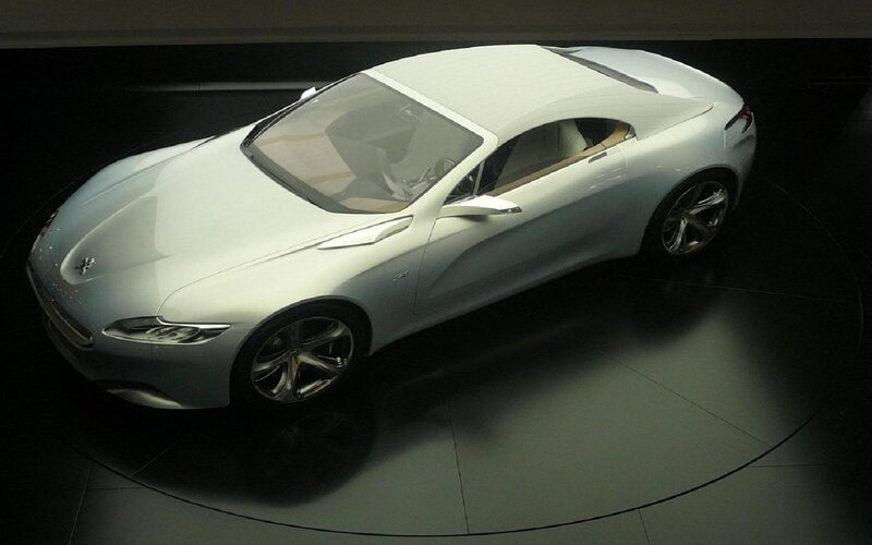 Silver Concept Car — White, Dramatic, Photograph, Showroom