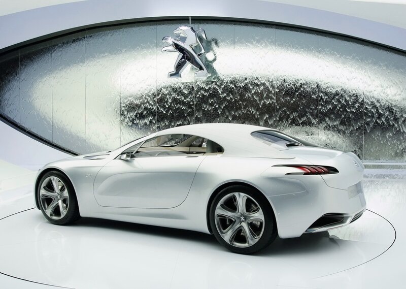 Silver Concept Car — White, Modern, Photograph, Logo, Display Stand