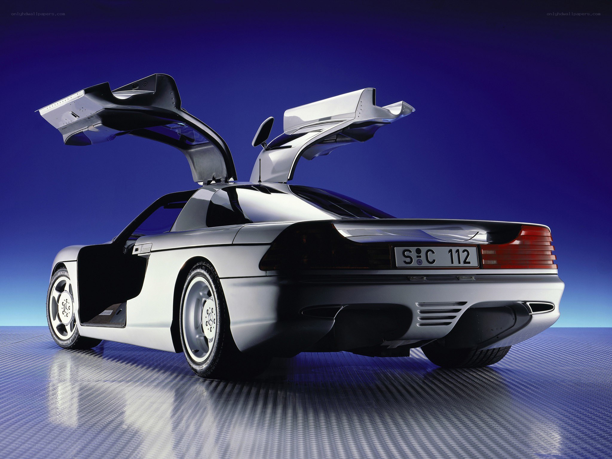 Silver concept car with gullwing doors
