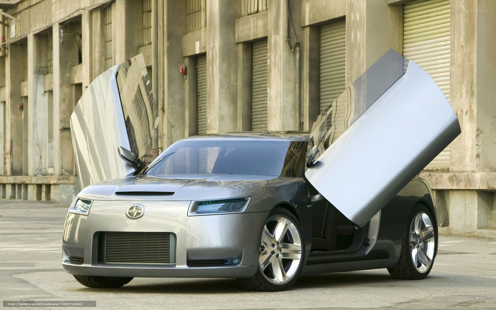 Silver concept car with gullwing doors