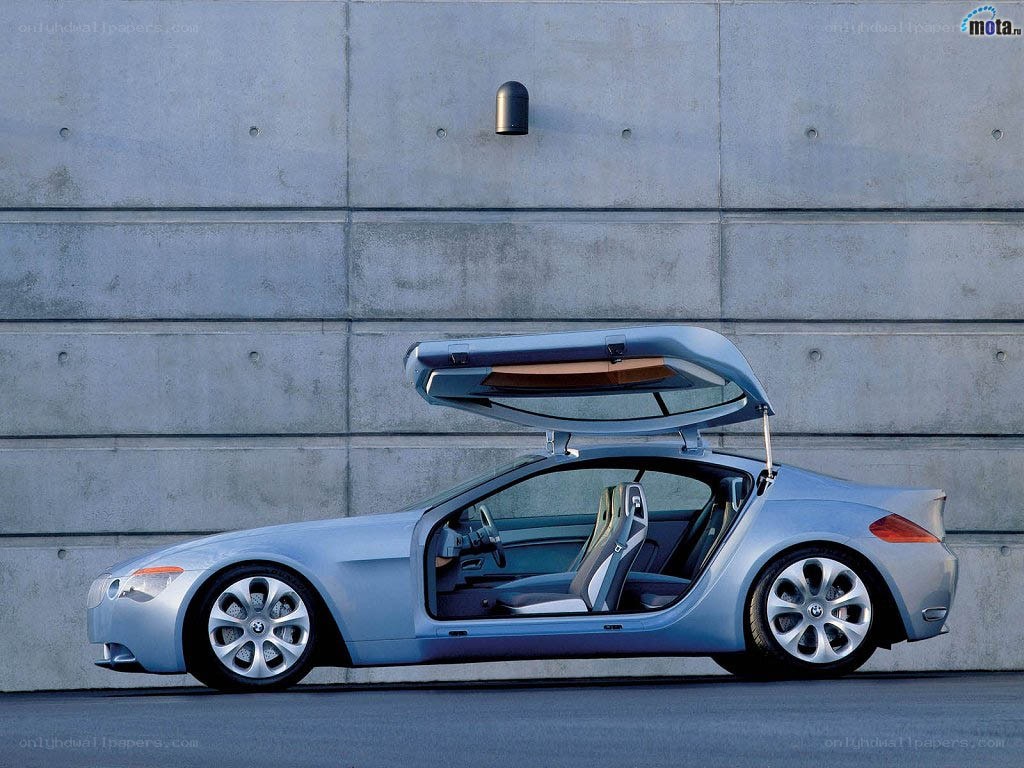 silver concept car with open doors