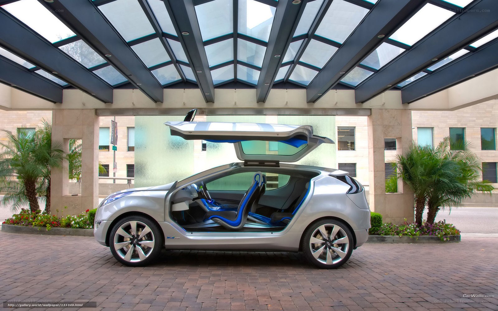 Silver concept car with open doors