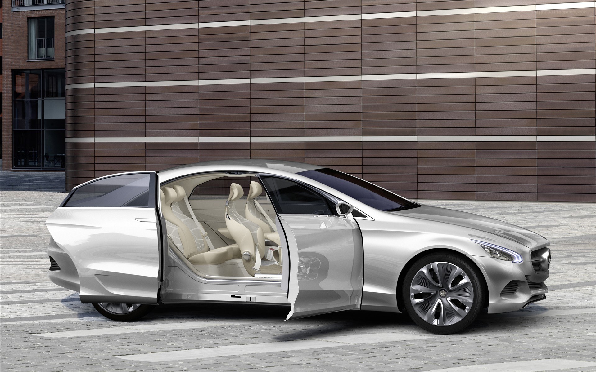 Silver concept car with open doors
