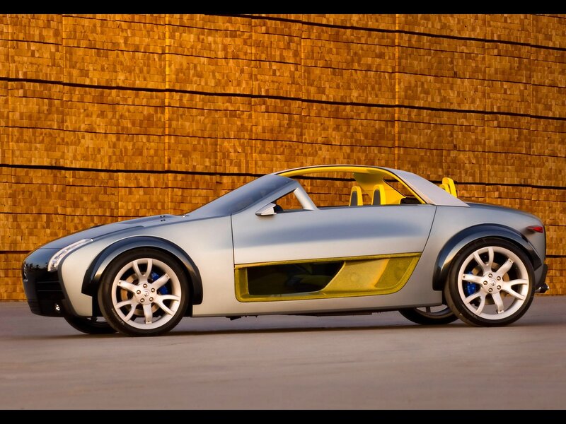 silver concept car with yellow accents