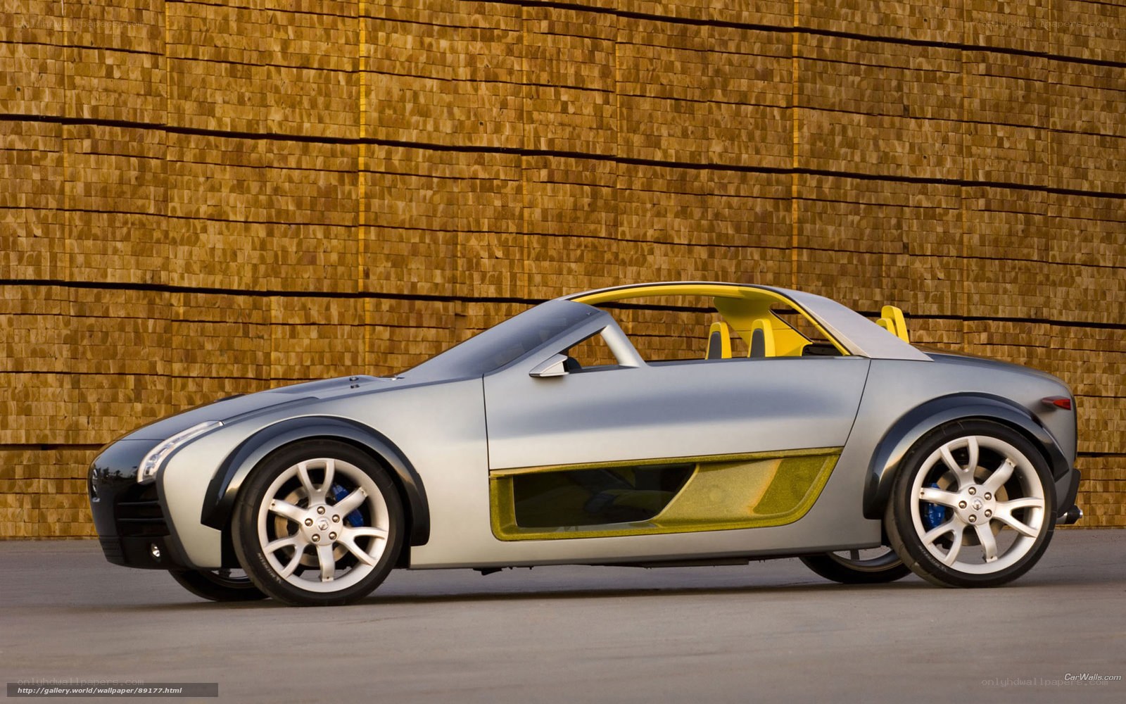 silver concept car with yellow accents