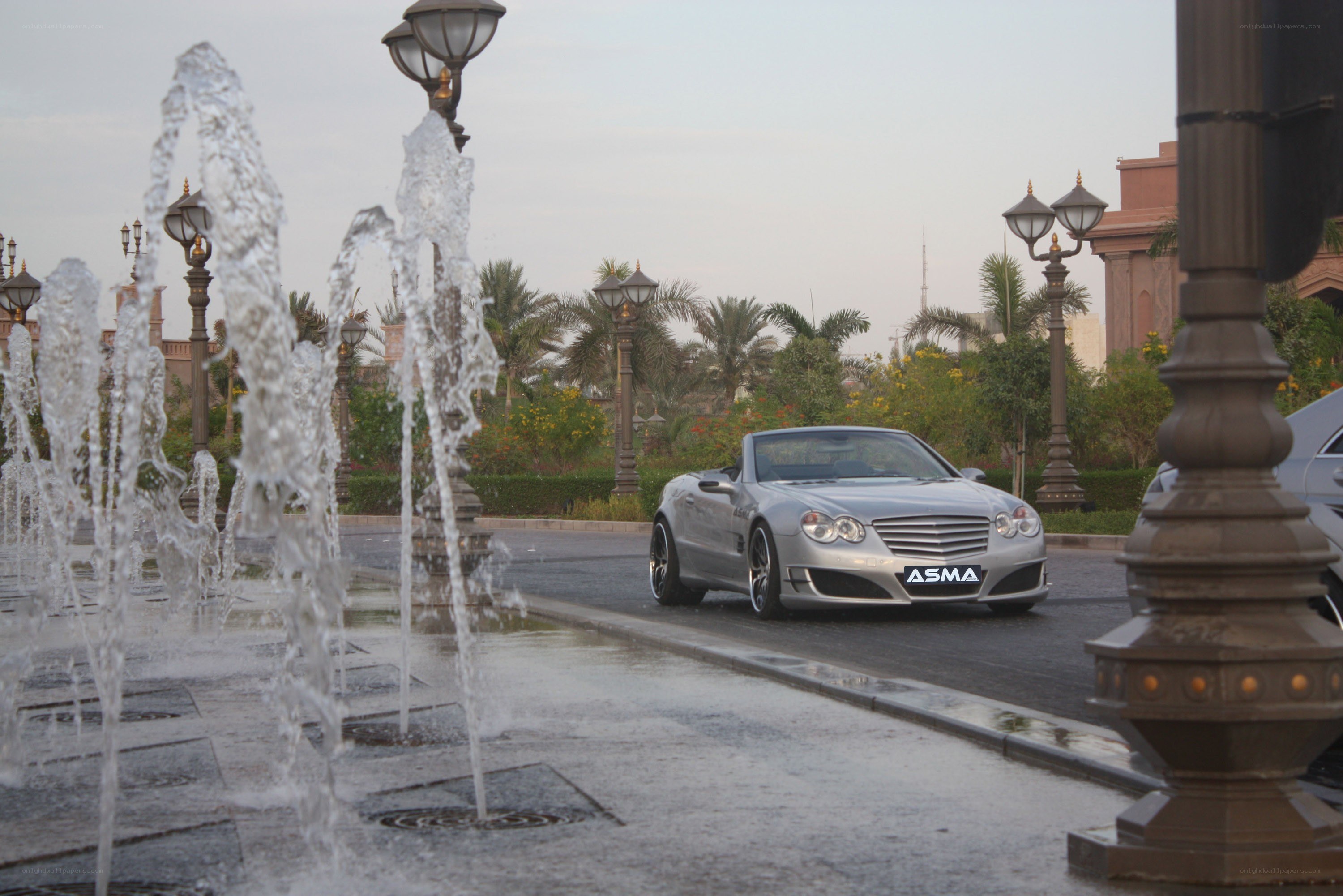 Silver convertible by fountain