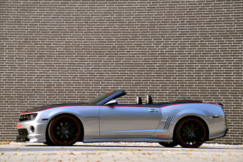 Silver Convertible Car — Calm, Afternoon, Photograph, Brick Wall, Black Wheels
