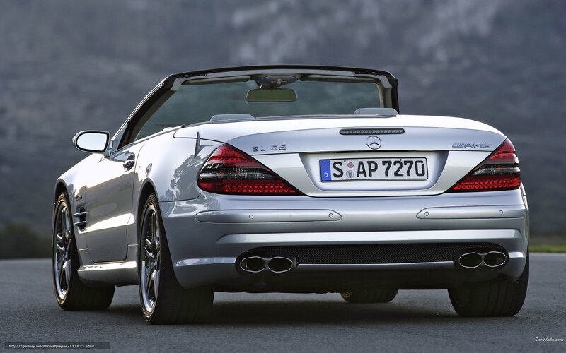 Silver Convertible Car — Dramatic, Photograph, License Plate, Mountains