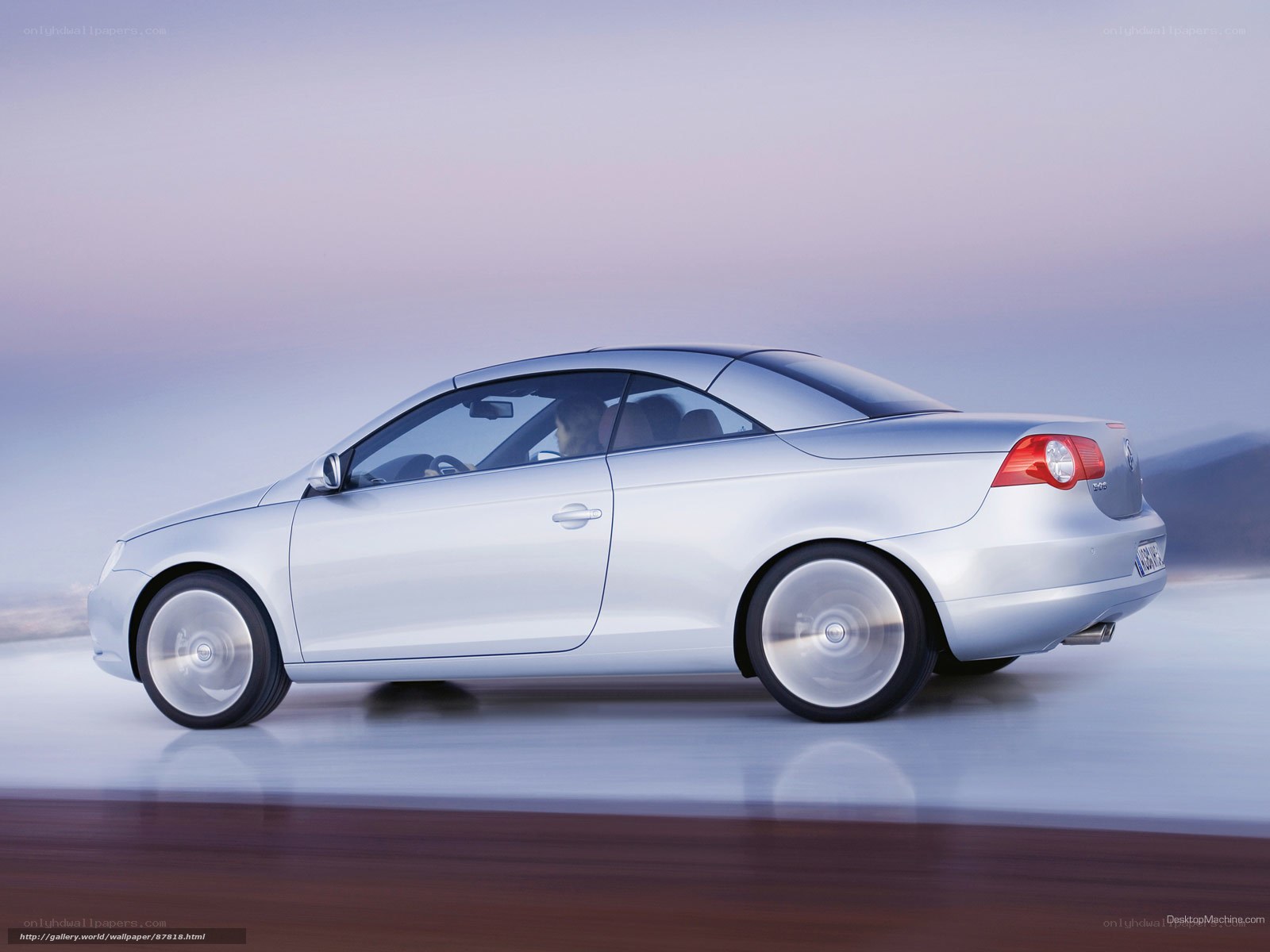 silver convertible car in motion