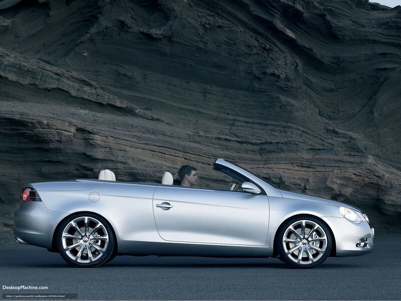 Silver convertible car on road