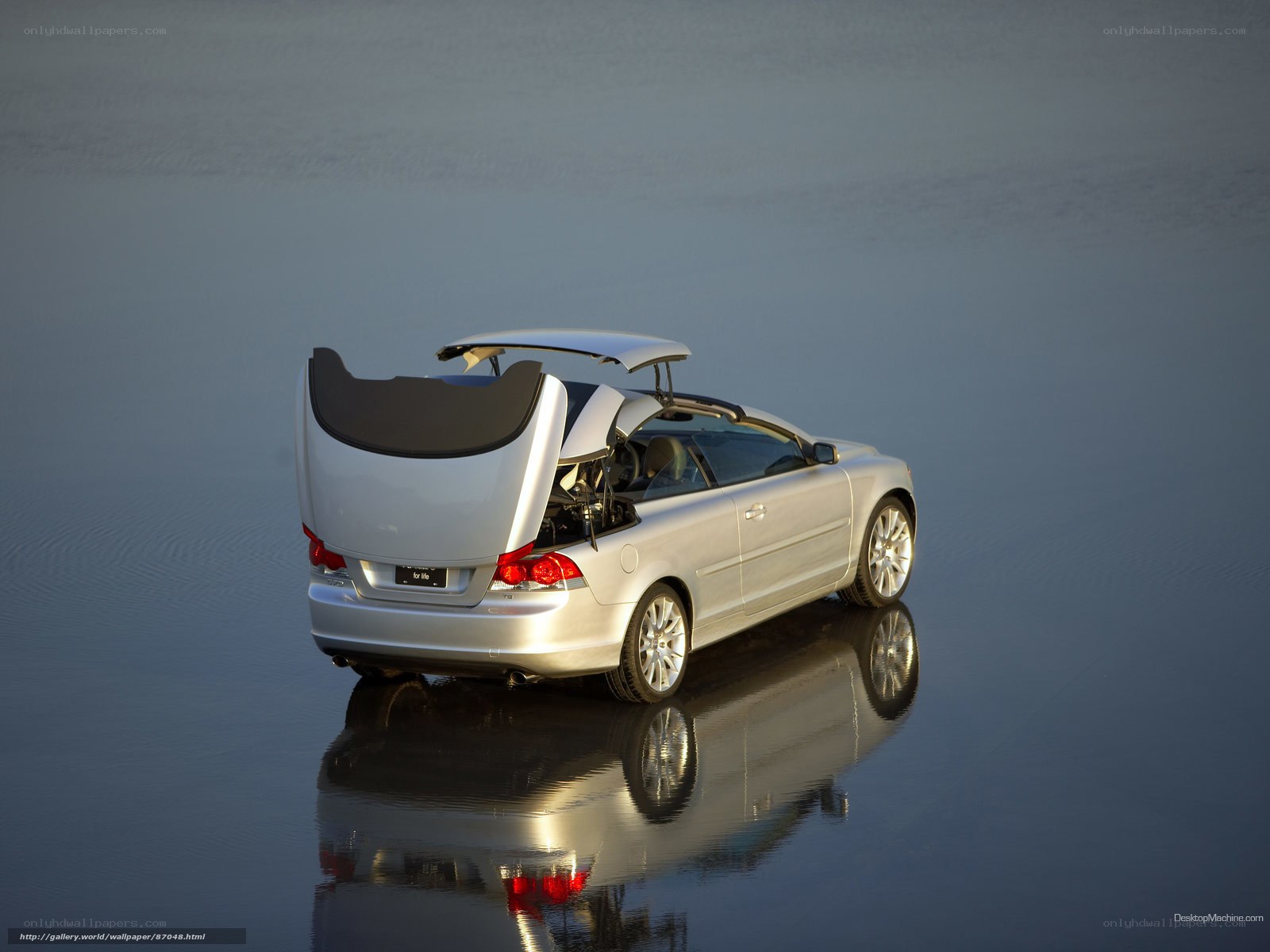 silver convertible car on water