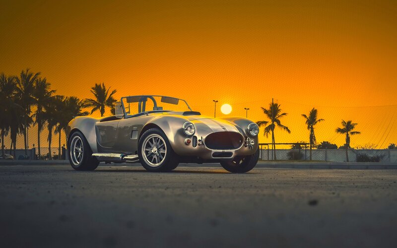 Silver Convertible Car — Orange, Dramatic
