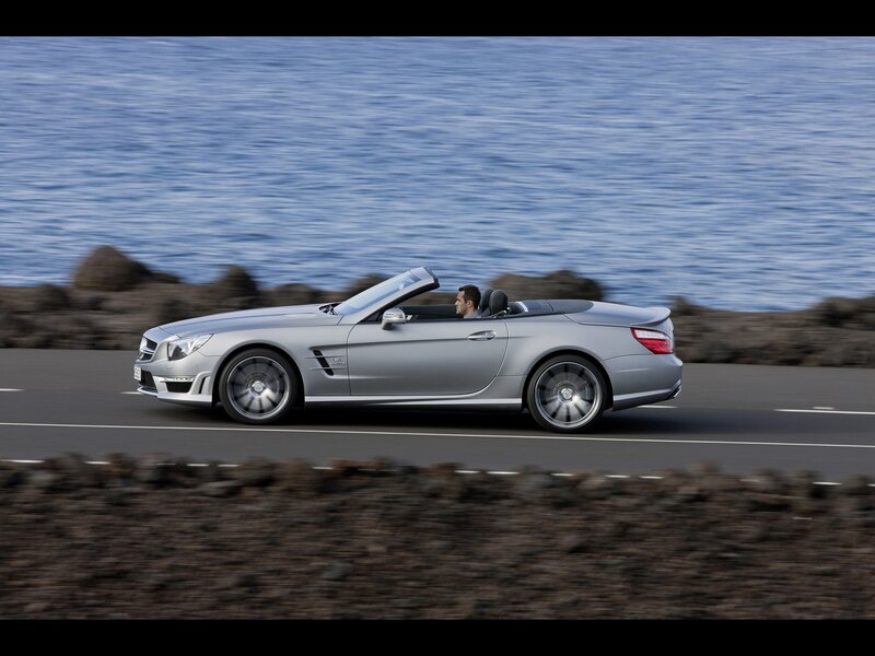 Silver Convertible Car — Serene, Afternoon, Photograph, Man, Road, Sea