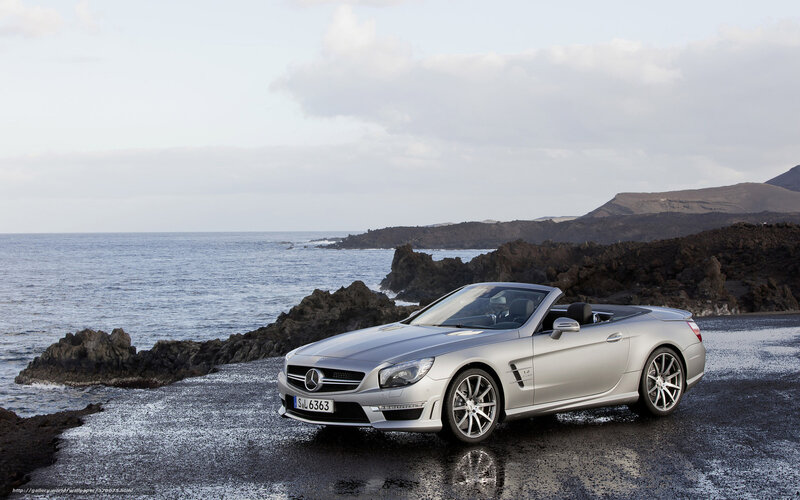 Silver Convertible Car — Serene, Afternoon, Photograph, Ocean, Rocks, Sky