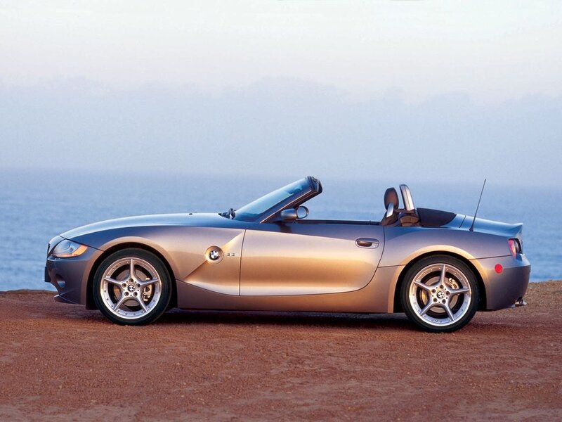 Silver Convertible Car — Serene, Sunset, Photograph, Ocean, Sky