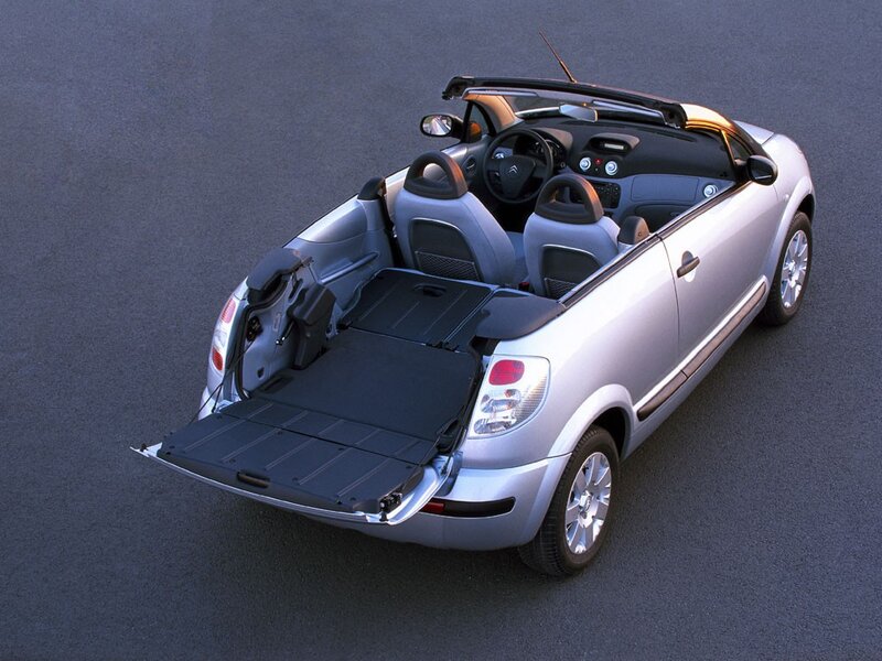 silver convertible car with trunk open