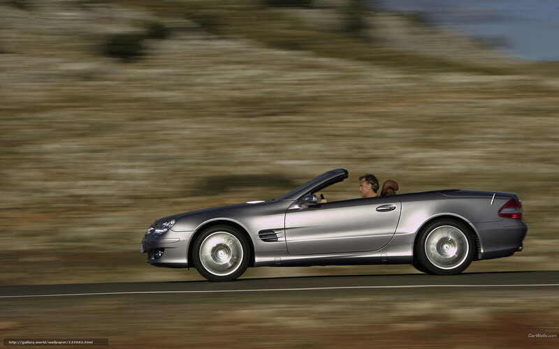 silver convertible driving on road