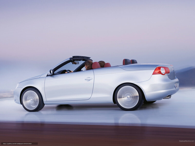 silver convertible driving