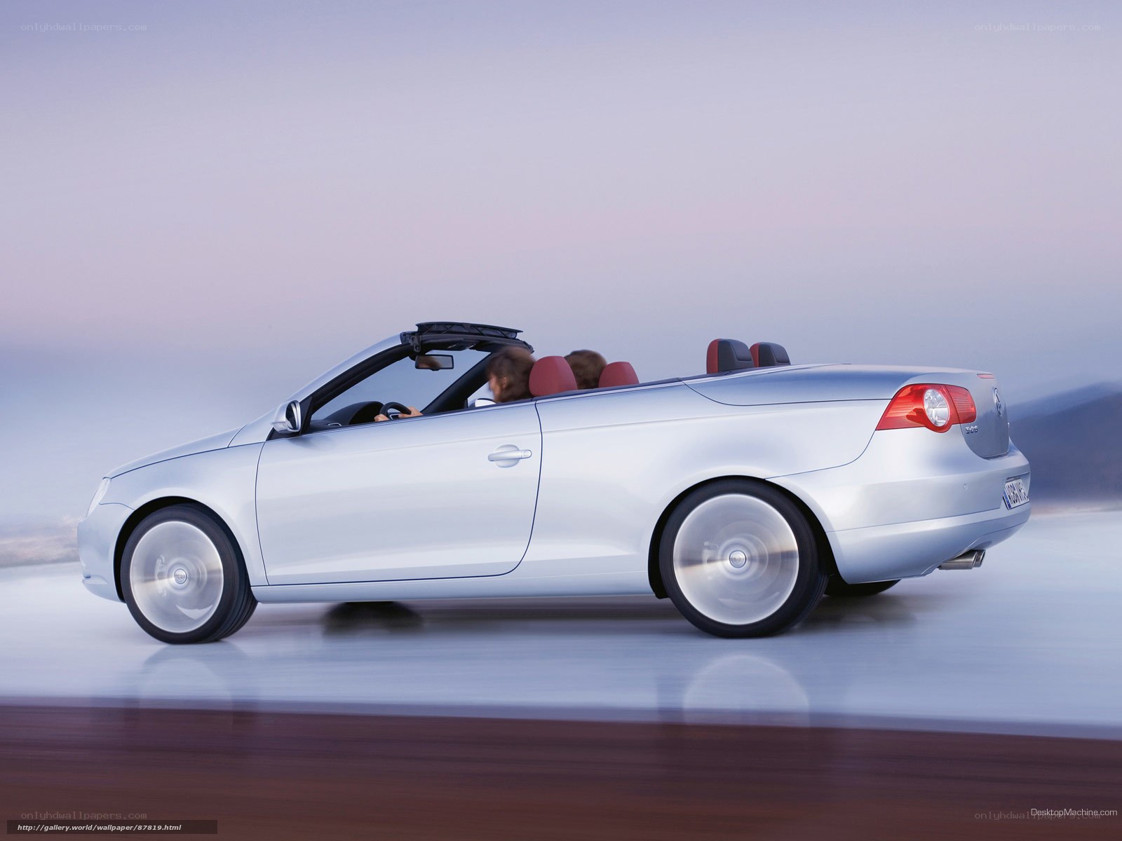 silver convertible driving