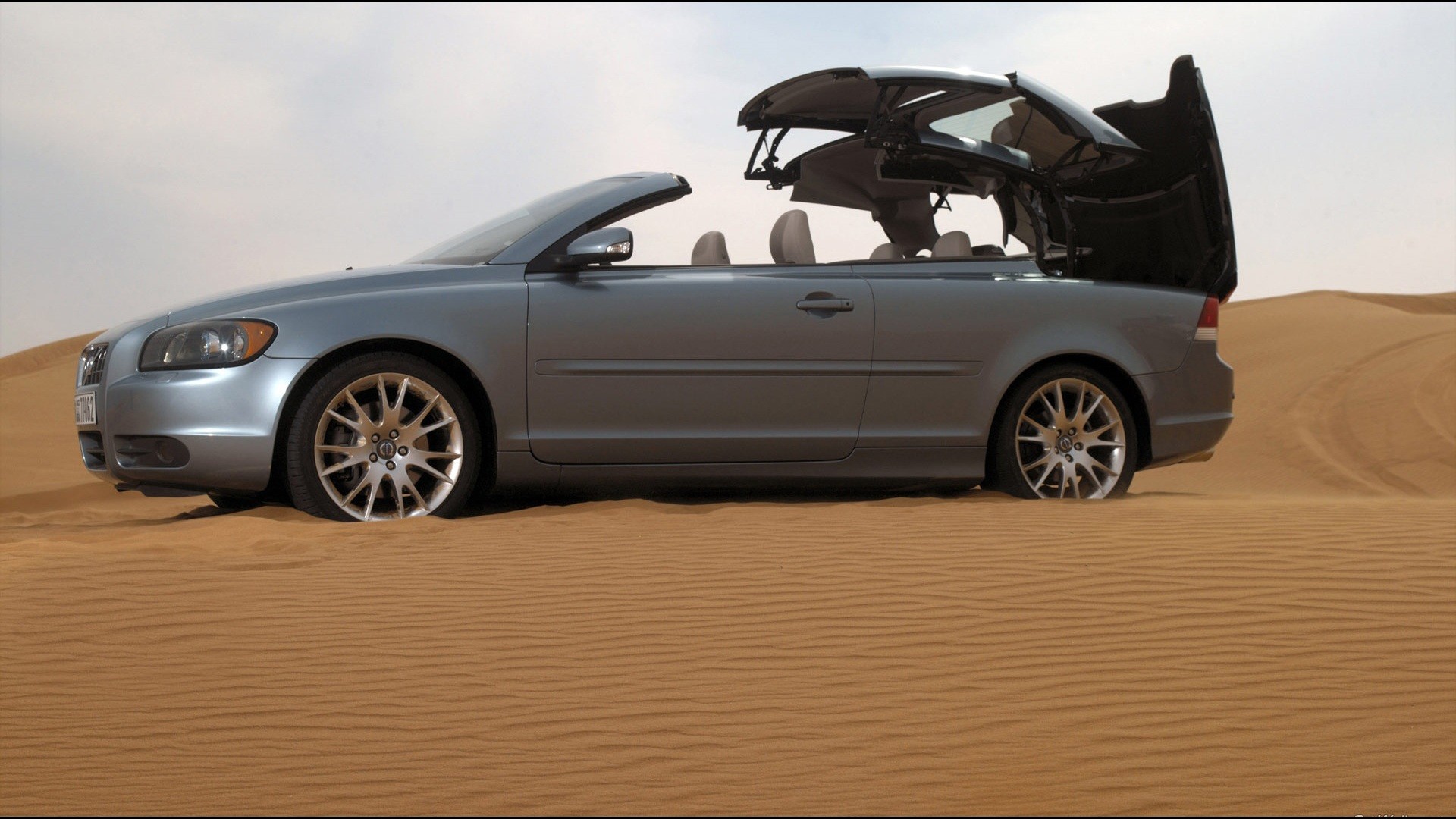 silver convertible in desert